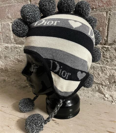 dior pom pom hat